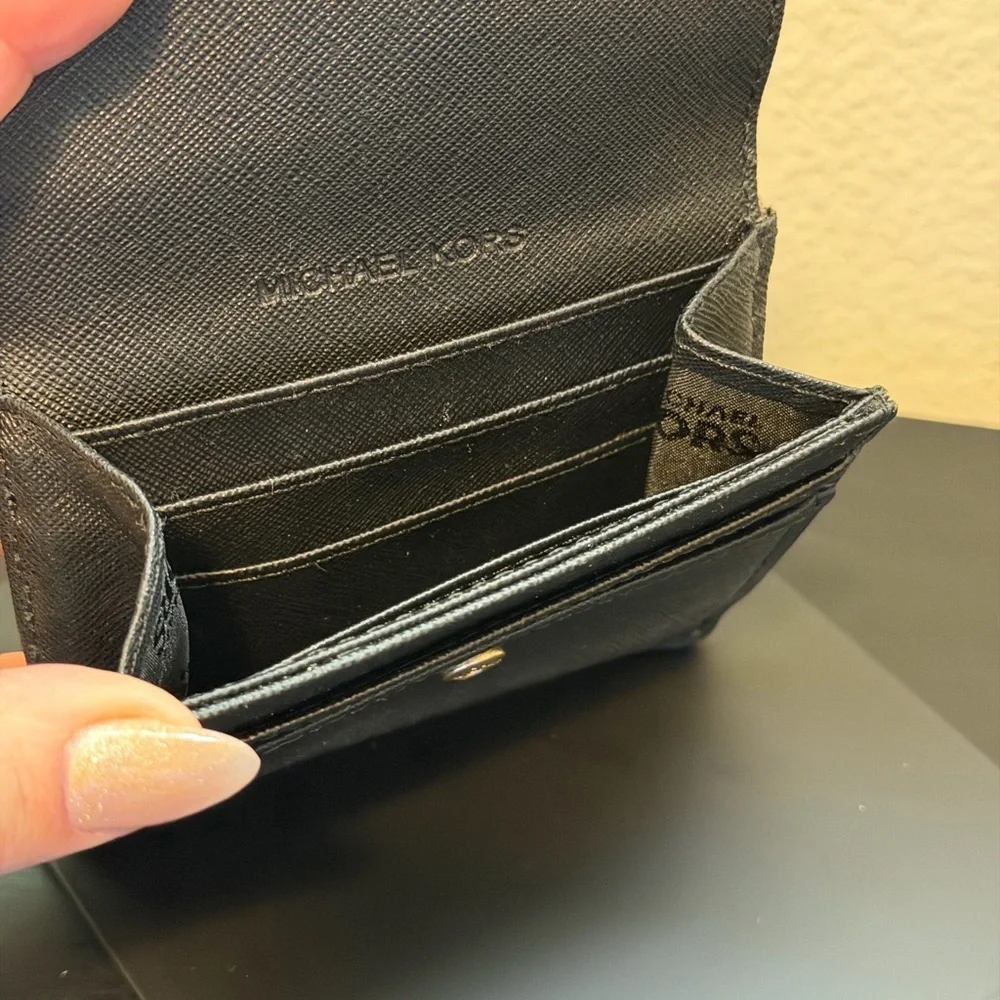 Michael Kors Black trifold wallet with Gold Logo